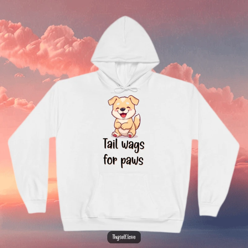 Funny hoodie design of a content dog wagging its tail while gazing at its paws, epitomizing happy solitude.