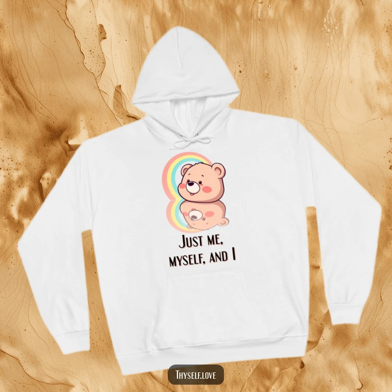 Funny Hoodie: A bear with a wide grin admiring a beautiful rainbow in its reflection, embodying warmth, joy, and lightheartedness.