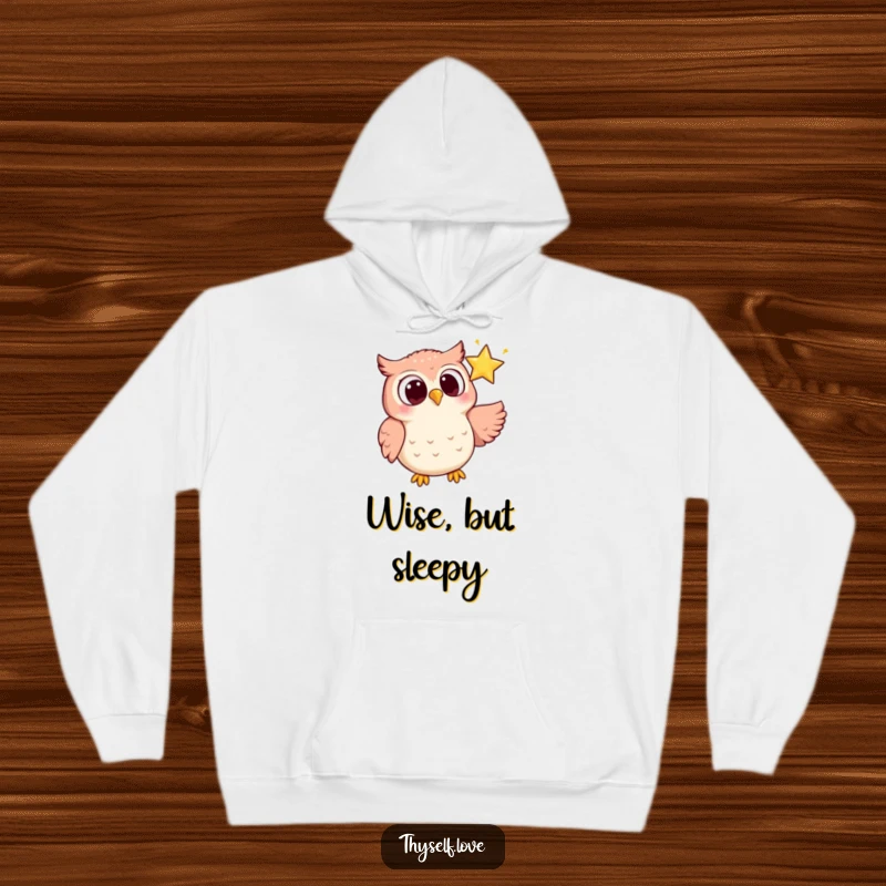 Funny hoodie with a joyful owl's wide eyes fixed lovingly on a shimmering star, symbolizing dreams and wonder.