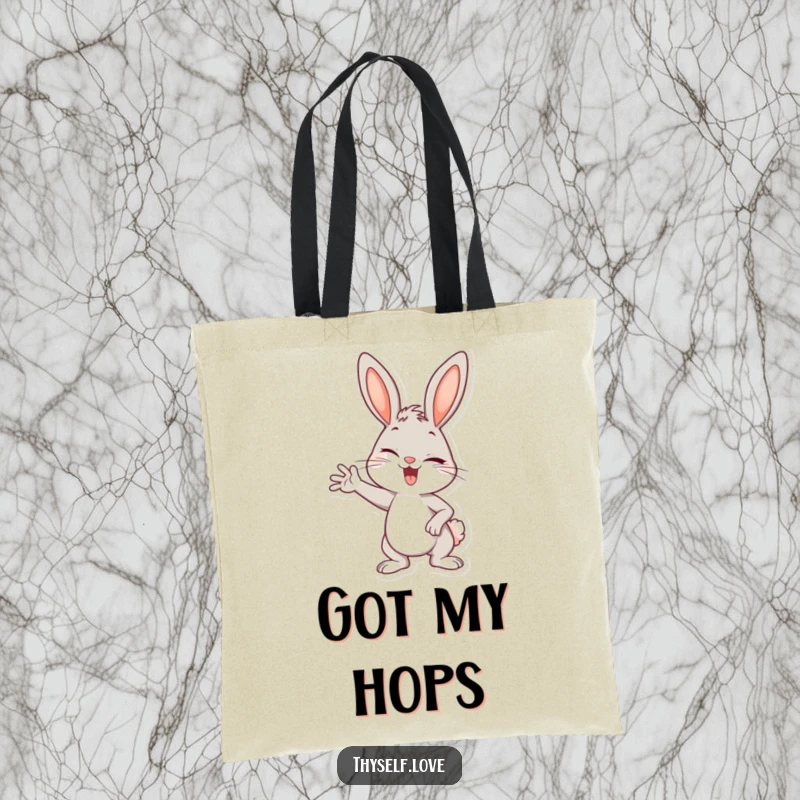 Funny tote bag with a cheerful bunny striking a confident pose and winking, perfect for adding charm to any outing.
